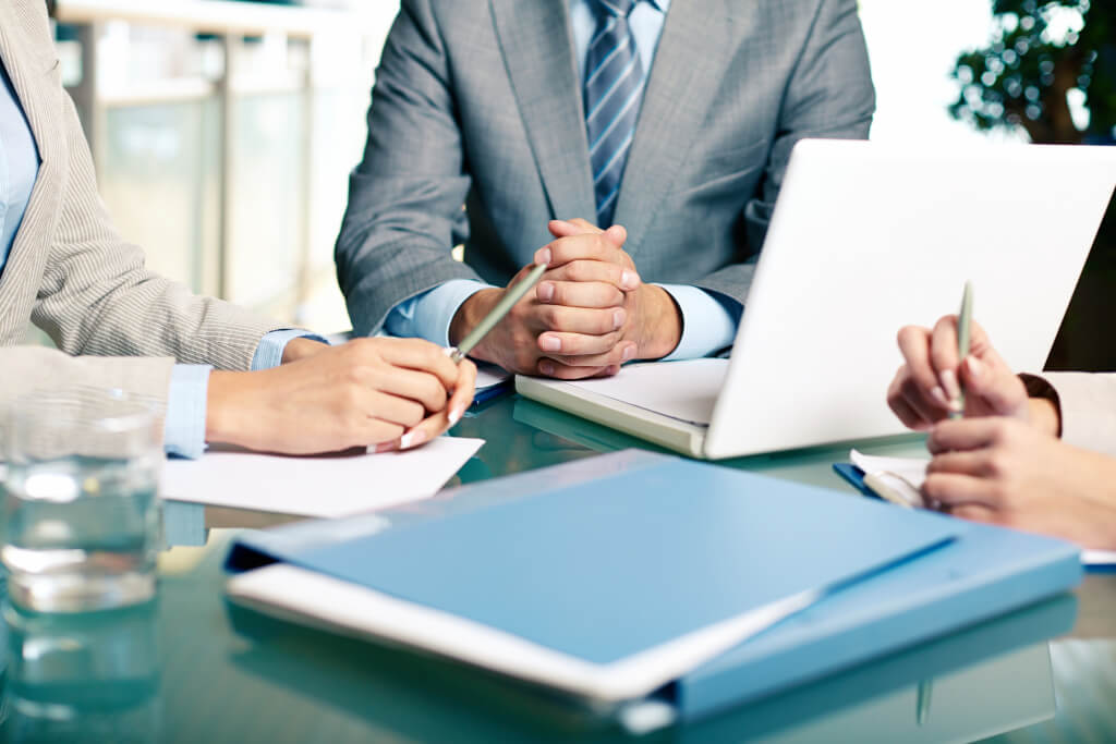 close-up-executives-sitting-table (1).jpg